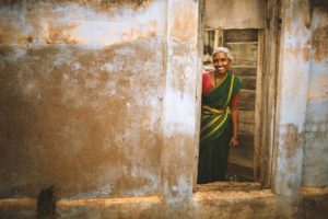 Indian woman standing in a doorway